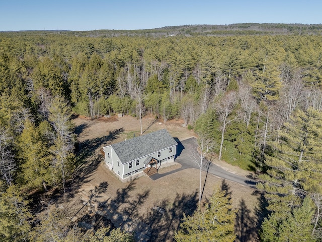 bird's eye view with a forest view