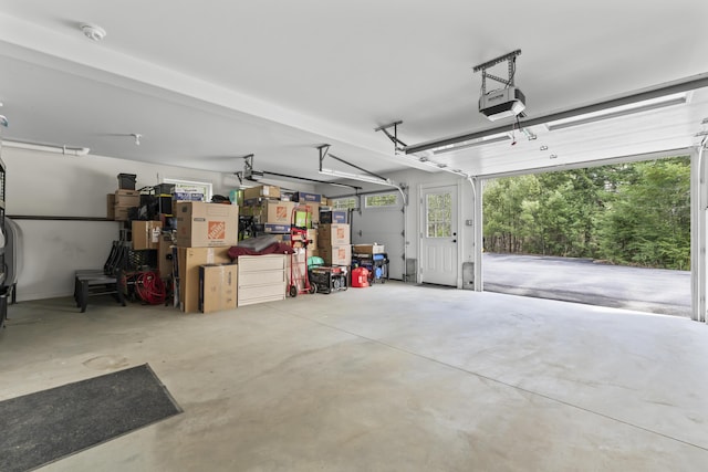 garage featuring a garage door opener