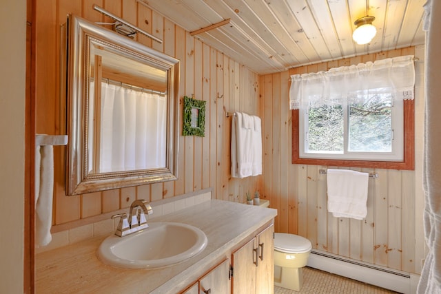 full bath featuring toilet, baseboard heating, a shower with shower curtain, wooden walls, and vanity