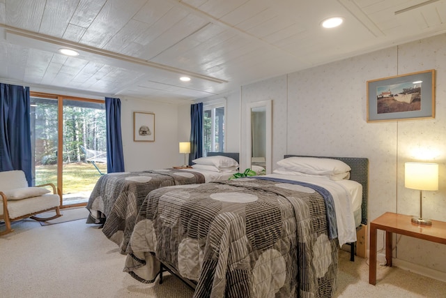 bedroom featuring wood ceiling, carpet, recessed lighting, and access to exterior