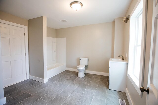 179 Main St, Corinth, ME 04427 - bathroom featuring baseboards, visible vents, and a healthy amount of sunlight