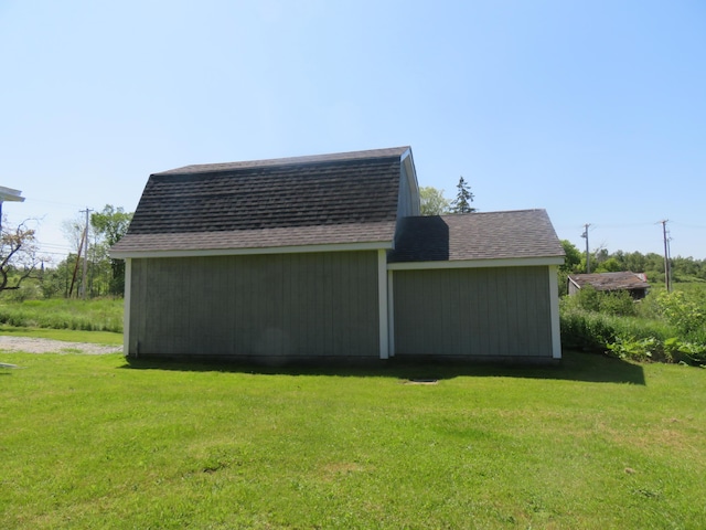 179 Main St, Corinth, ME 04427 - view of home's exterior featuring a lawn and a shingled roof