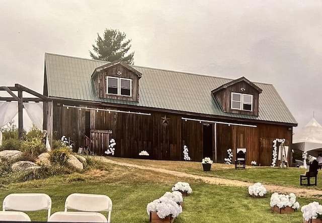 54 Folsom Ridge Rd, Burlington, ME 04417 - exterior space with an outdoor structure, a front lawn, metal roof, and a barn