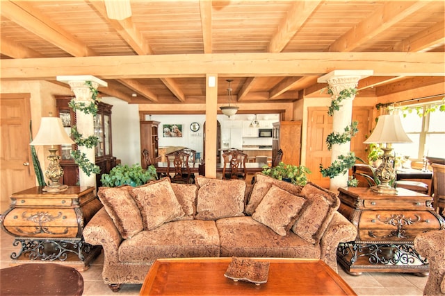 54 Folsom Ridge Rd, Burlington, ME 04417 - tiled living room featuring wood ceiling and beamed ceiling