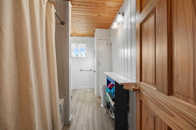 54 Folsom Ridge Rd, Burlington, ME 04417 - bathroom with wood finished floors and wooden ceiling