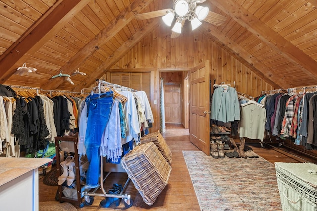 54 Folsom Ridge Rd, Burlington, ME 04417 - spacious closet featuring wood finished floors, a ceiling fan, and vaulted ceiling with beams