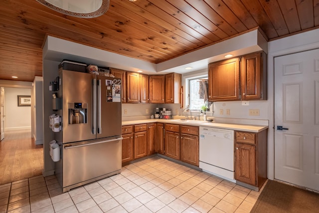31 Pulpit Rock Rd, Raymond, ME 04071 - kitchen with stainless steel refrigerator with ice dispenser, dishwasher, wood ceiling, a sink, and light countertops