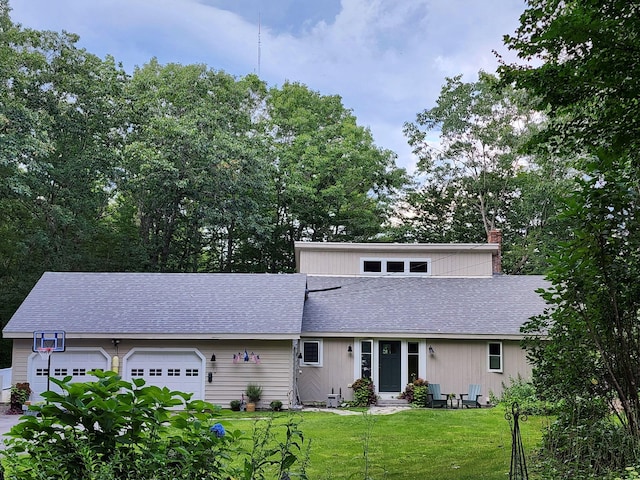 31 Pulpit Rock Rd, Raymond, ME 04071 - view of front of property featuring roof with shingles, an attached garage, a front lawn, and a chimney