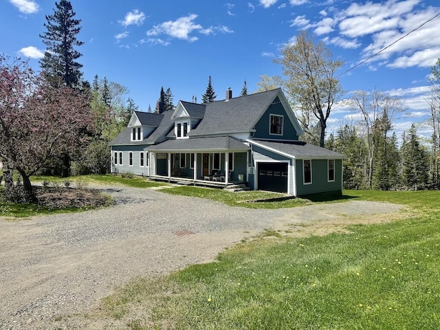 284 Dallas Hill Rd, Dallas Plt, ME 04970 - view of front of home with a porch, driveway, and a front yard