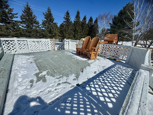 view of snow covered deck