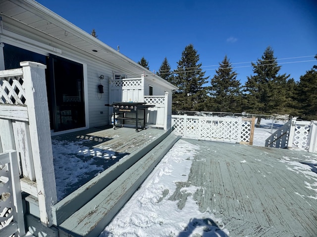 view of snow covered deck