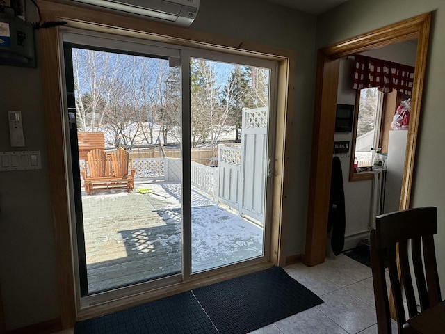entryway featuring a healthy amount of sunlight and tile patterned floors
