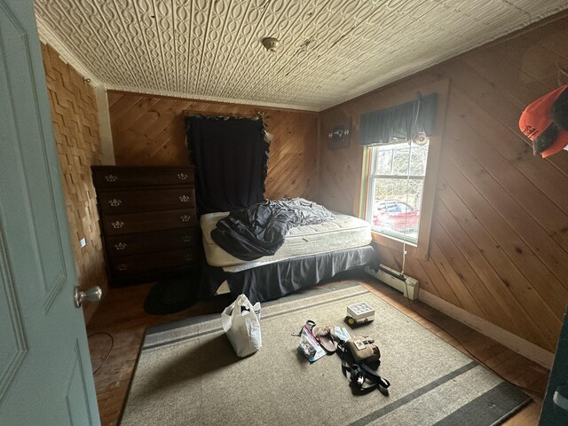 18 View St, Jonesport, ME 04649 - bedroom featuring wooden walls and baseboard heating