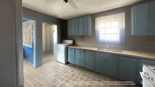 18 View St, Jonesport, ME 04649 - kitchen featuring washer / dryer, a sink, backsplash, a ceiling fan, and light countertops