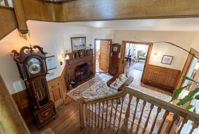 36 Cutler Rd, East Machias, ME 04630 - foyer entrance featuring wainscoting, wood finished floors, and a fireplace