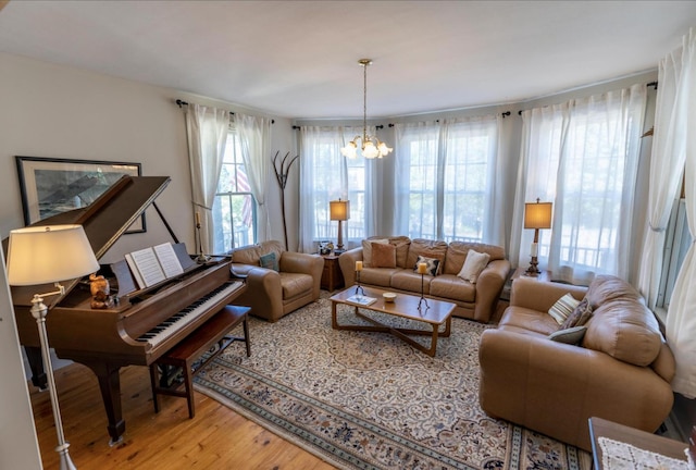 36 Cutler Rd, East Machias, ME 04630 - living area featuring light wood finished floors and a chandelier