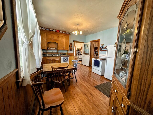 36 Cutler Rd, East Machias, ME 04630 - dining room with a chandelier and light wood-type flooring