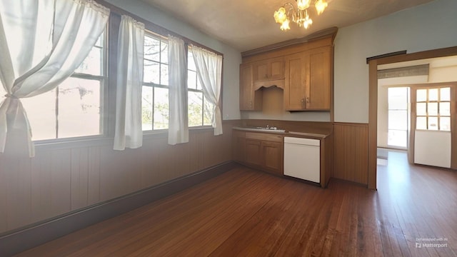 36 Cutler Rd, East Machias, ME 04630 - kitchen featuring white dishwasher, dark wood-style floors, wainscoting, a sink, and a chandelier