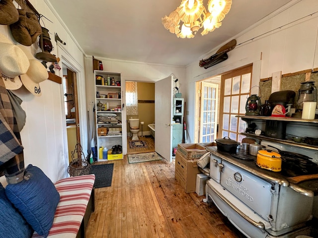 36 Cutler Rd, East Machias, ME 04630 - living area featuring wood-type flooring, crown molding, and a chandelier