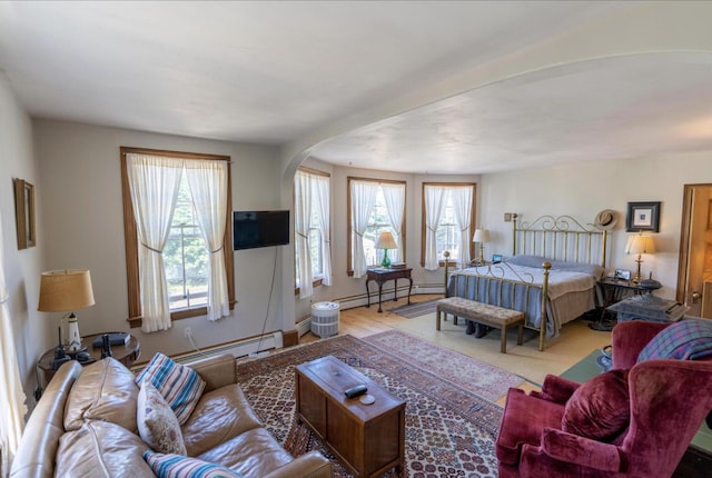 36 Cutler Rd, East Machias, ME 04630 - bedroom featuring baseboard heating and arched walkways