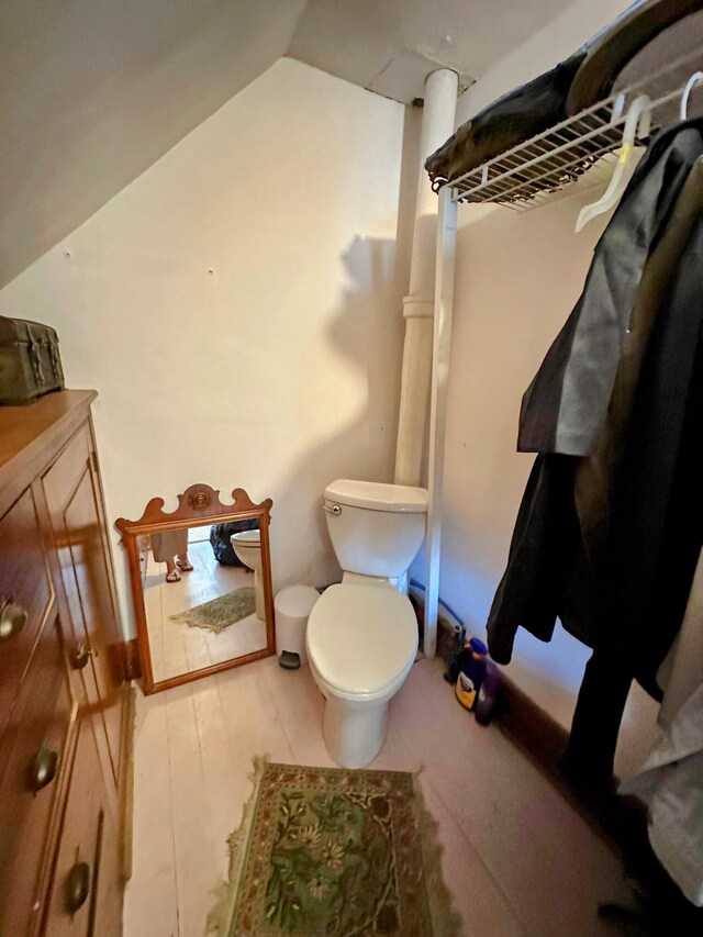 36 Cutler Rd, East Machias, ME 04630 - bathroom featuring toilet, vanity, and lofted ceiling