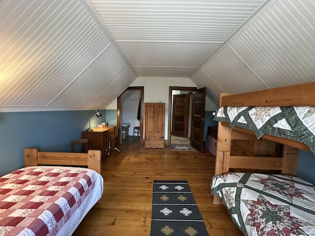 36 Cutler Rd, East Machias, ME 04630 - bedroom featuring vaulted ceiling and wood-type flooring