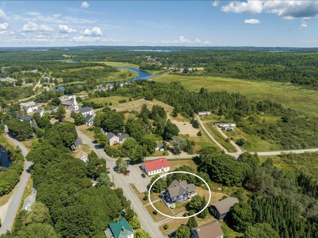 36 Cutler Rd, East Machias, ME 04630 - aerial view of property and surrounding area with a heavily wooded area and a nearby body of water