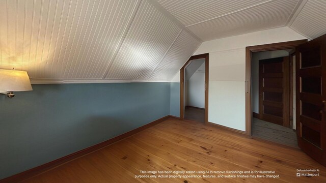 36 Cutler Rd, East Machias, ME 04630 - additional living space with lofted ceiling, hardwood / wood-style flooring, and baseboards