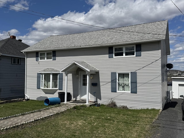 362 Saint Thomas St, Madawaska, ME 04756 - view of front of home featuring a front lawn and roof with shingles