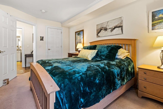 bedroom featuring light carpet