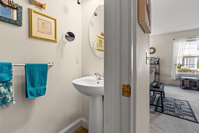 bathroom featuring baseboards