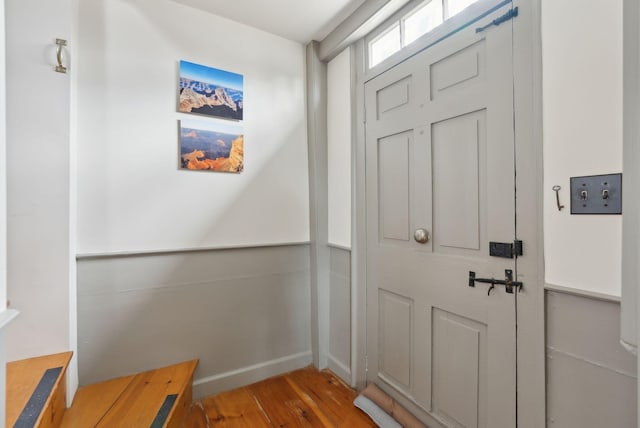 37 Main St, Raymond, ME 04071 - doorway to outside with baseboards and wood finished floors