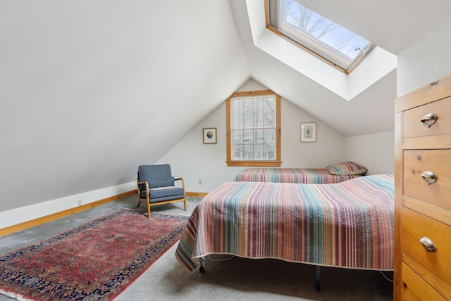 37 Main St, Raymond, ME 04071 - carpeted bedroom with vaulted ceiling with skylight