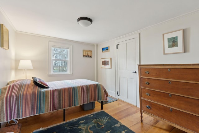 37 Main St, Raymond, ME 04071 - bedroom featuring ornamental molding and light wood-style flooring