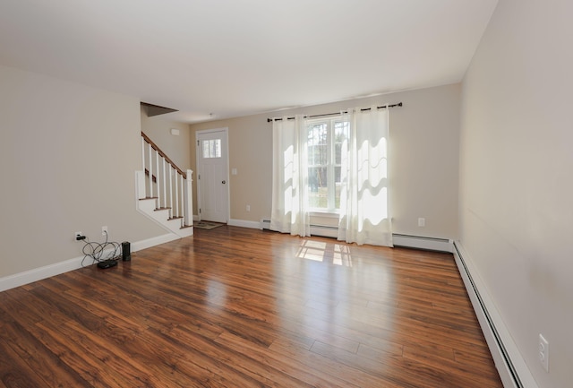 2 Oliver Ln, Kennebunk, ME 04043 - interior space featuring wood finished floors, stairs, and a baseboard radiator