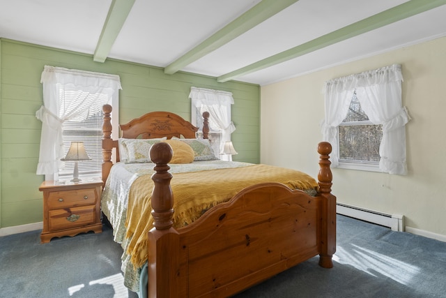 carpeted bedroom with baseboard heating, baseboards, beam ceiling, and multiple windows