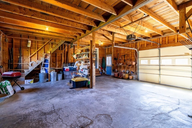 garage featuring a garage door opener