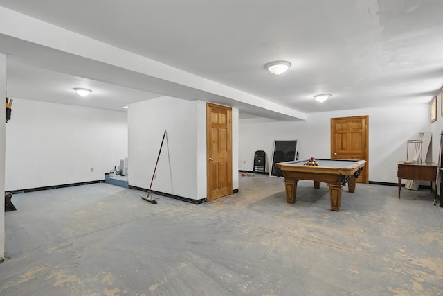 recreation room with concrete flooring, baseboards, and billiards