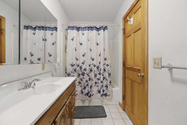 bathroom with vanity, tile patterned flooring, and shower / tub combo with curtain