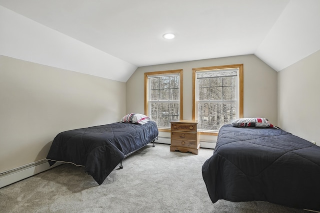 carpeted bedroom featuring vaulted ceiling and a baseboard radiator