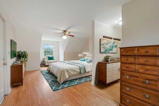 bedroom featuring a ceiling fan and light wood-style floors