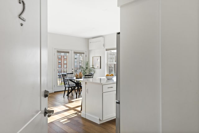 148 Newbury St Unit 2, Portland, ME 04101 - hallway with dark wood-style flooring and french doors