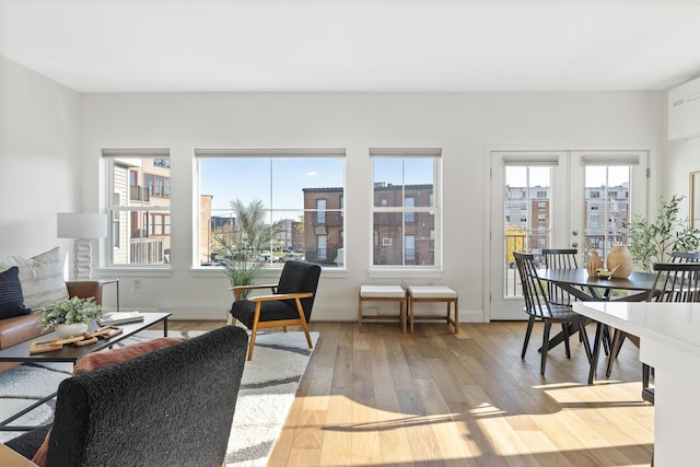 148 Newbury St Unit 2, Portland, ME 04101 - living area featuring baseboards and hardwood / wood-style floors