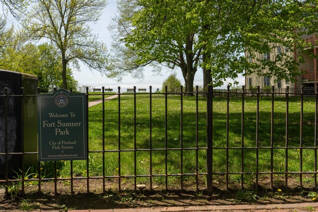 148 Newbury St Unit 2, Portland, ME 04101 - view of gate with a lawn and fence