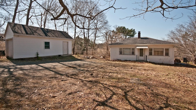 exterior space featuring an outdoor structure