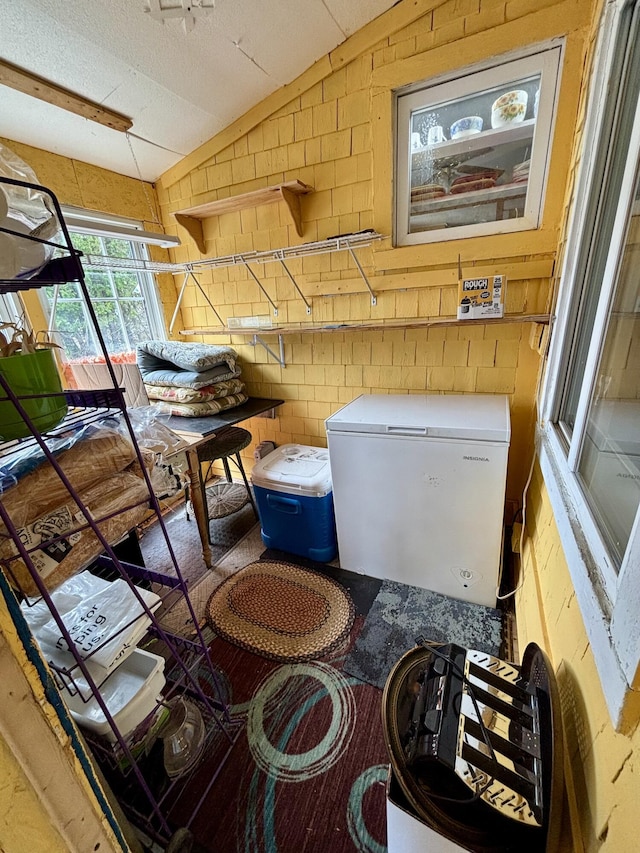 interior space featuring white refrigerator