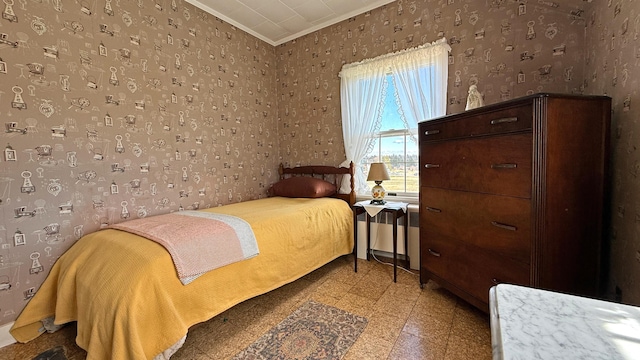 812 County Rd, Lubec, ME 04652 - bedroom with crown molding, wallpapered walls, and light flooring