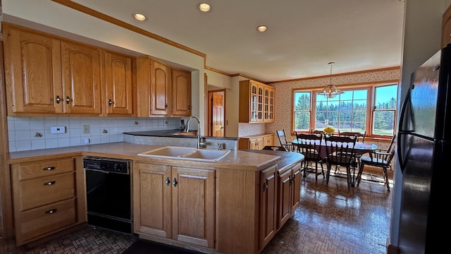 812 County Rd, Lubec, ME 04652 - kitchen featuring black appliances, a sink, a peninsula, a chandelier, and recessed lighting
