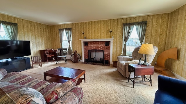 812 County Rd, Lubec, ME 04652 - living area featuring wallpapered walls, a fireplace, and carpet