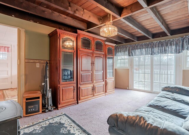 84 Hillside Rd, Westbrook, ME 04092 - living area featuring beam ceiling, wooden ceiling, and light carpet